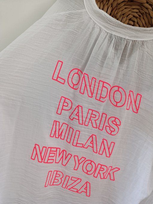 Chemise blanche avec noms de villes au dos en rose fluo t.u 36 au 42