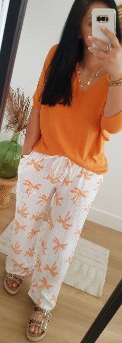 Beau pantalon blanc en gaz de coton avec des palmiers orange jusqu'au 42 taille unique