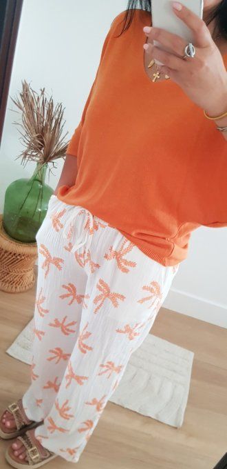 Beau pantalon blanc en gaz de coton avec des palmiers orange jusqu'au 42 taille unique