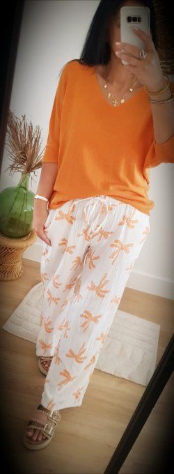 Beau pantalon blanc en gaz de coton avec des palmiers orange jusqu'au 42 taille unique