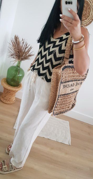 Pull sans manches ziz zag lurex jusqu'au 42.Taille unique 