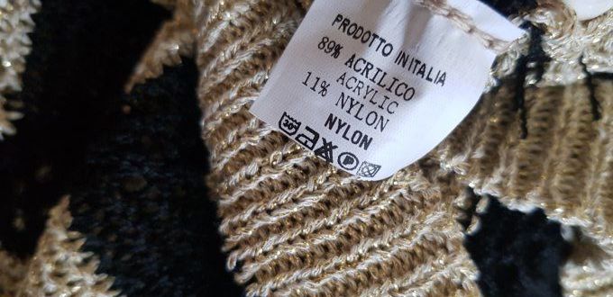 Pull sans manches ziz zag lurex jusqu'au 42.Taille unique 