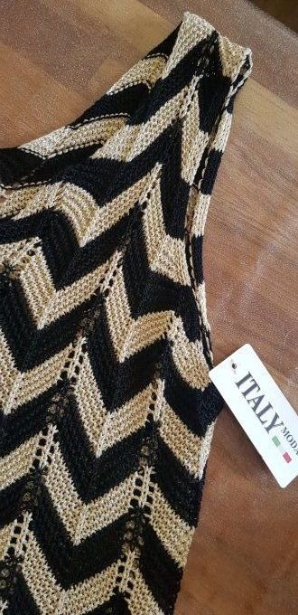 Pull sans manches ziz zag lurex jusqu'au 42.Taille unique 