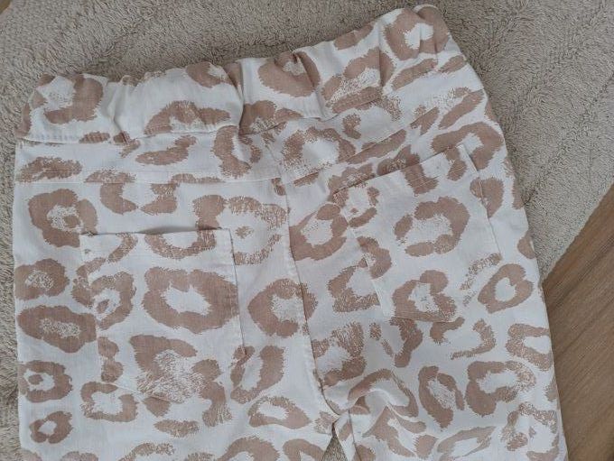 Pantalon magique imprimé animal sur fond blanc taille unique jusqu'au 42